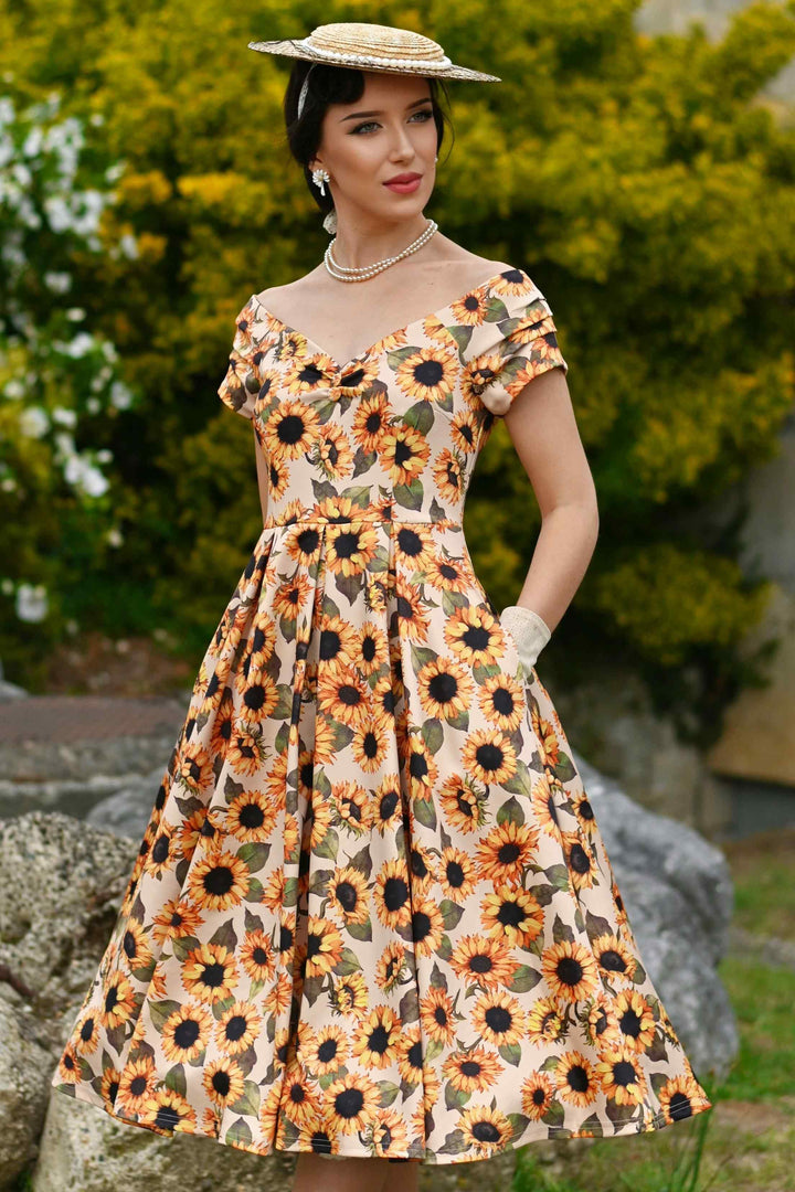 A Close up of a Model wearing a Lily Sunflower Dress | Vintage Floral Dress
