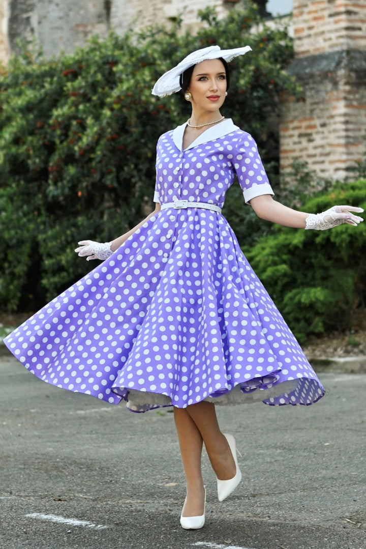 A Lovely Model wearing a Mollie Shirt Dress in Lilac Polka Dots