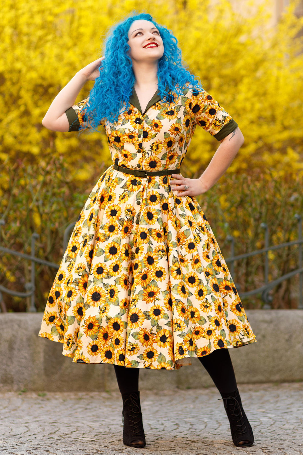 A charming model wearing the Mollie Sunflower Midi Shirt Dress