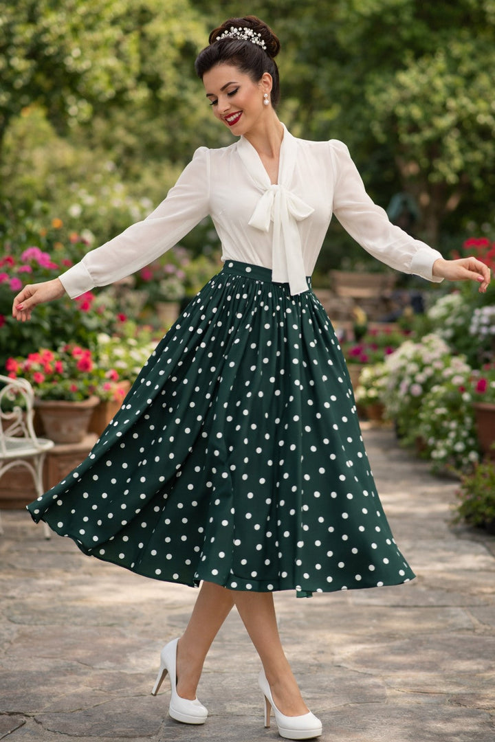 A lady wears a Margaret Off White Blouse