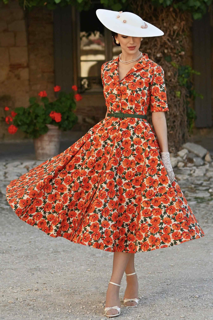 A lovely lady wears A Mollie Shirt Dress in Orange Poppy Print