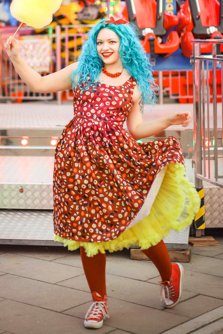A lovely model wearing anAmanda Sushi & Sashimi Flared Dress In Burgundy