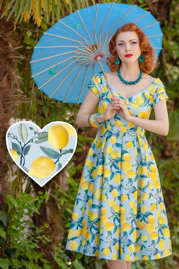 A lovely model wears the Lily Light Blue Lemon Off Shoulder Summer Midi Dress