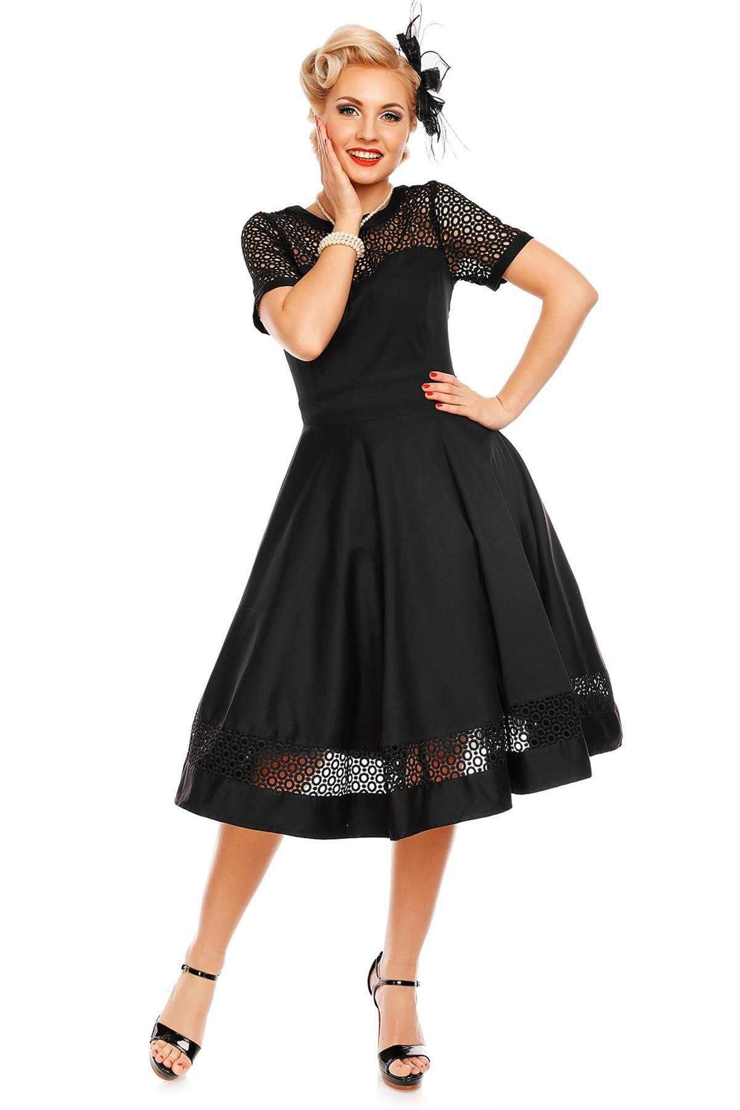 A model in Tess Crochet Lace Formal Dress In Black