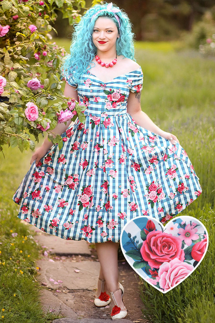 A model wearing a Lily Floral Gingham Off Shoulder Dress In Blue