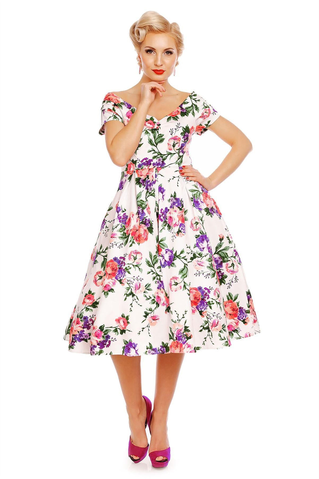 A model wearing a Lily White Floral Off Shoulder Dress in a studio