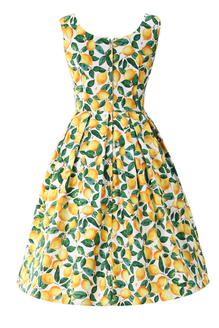 Back view of Lady in Amanda Juicy Yellow Lemons on White Dress | 50s Style Dress