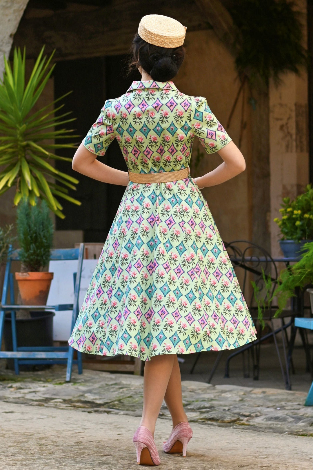 Back view of Lovely Model in Mabel Quatrefoil Floral in Pastels Dress | Vintage Floral Dress