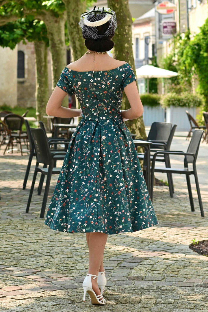 Back view of Model wearing a Lily Ditsy Flowers on Emerald Green Dress | Vintage Floral Dress