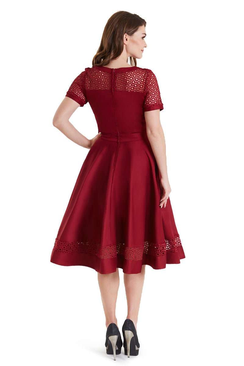 Back view of a lady in a Tess Crochet Lace Formal Dress In Burgundy