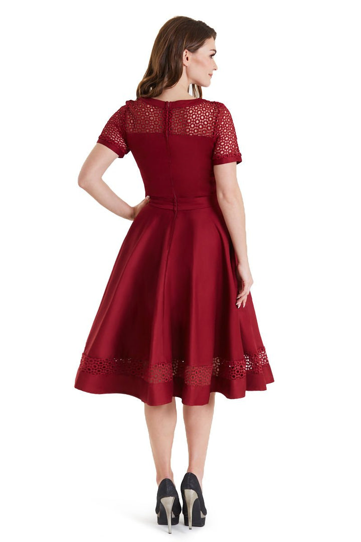 Back view of a lady in a Tess Crochet Lace Formal Dress In Burgundy