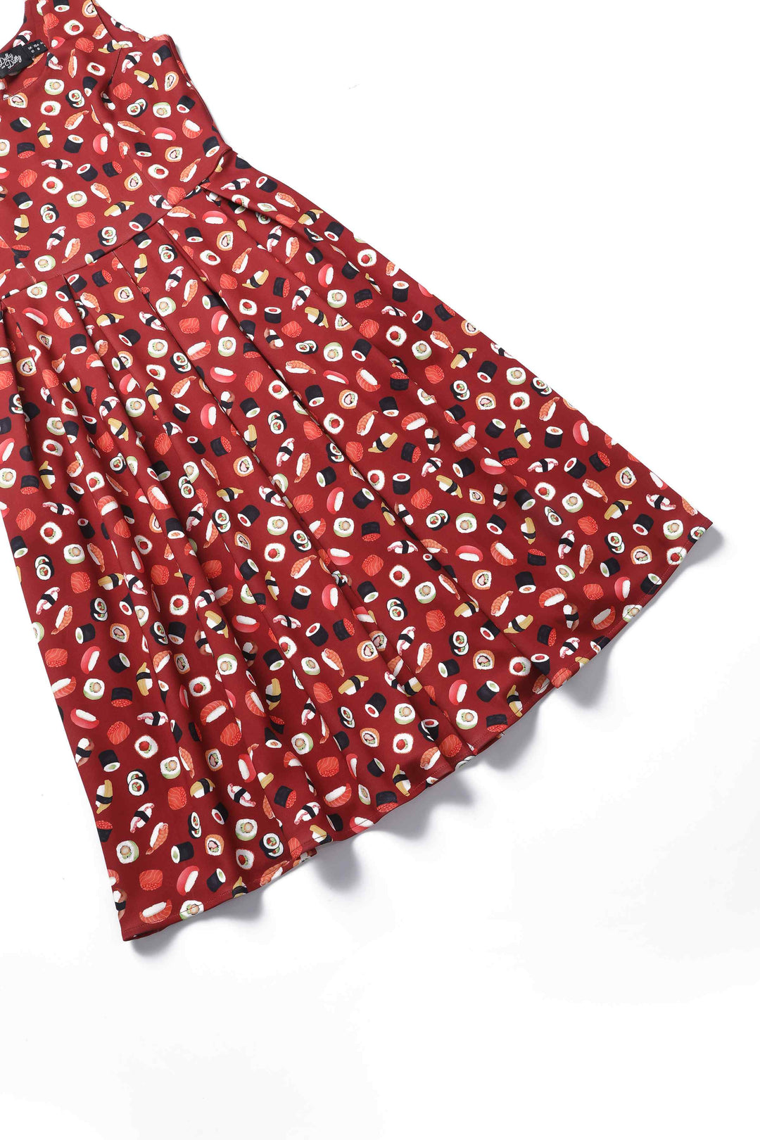 Close- up view of the skirt of Amanda Sushi & Sashimi Flared Dress In Burgundy