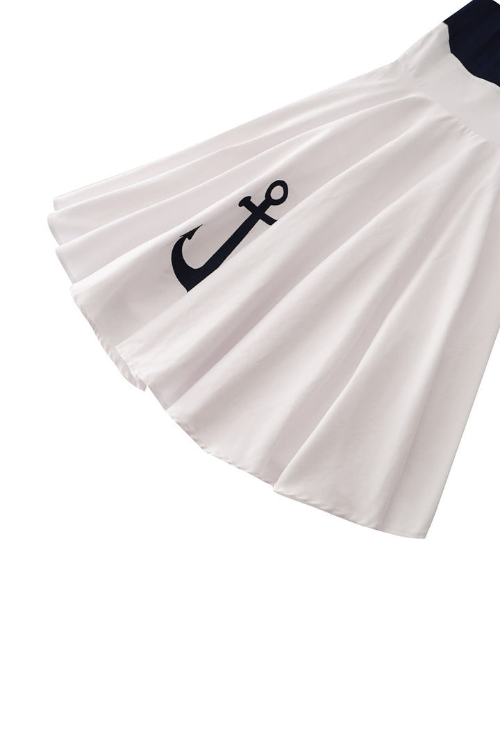 Close up view of the skirt of Darlene White Circle Dress with Embroidered Anchors