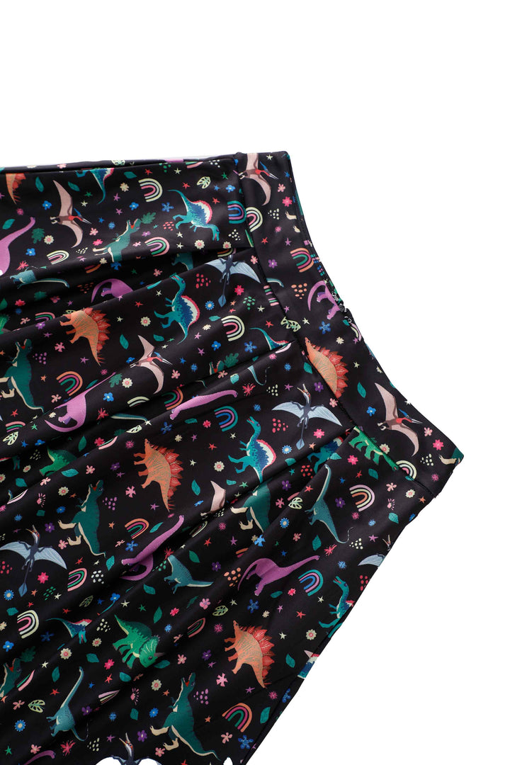Close up view the waistband of Aisley Dinosaur Rainbow Skirt | Novelty Print Skirt