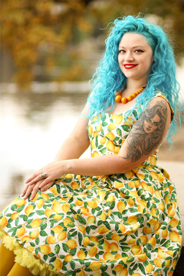 Lady in Amanda Juicy Yellow Lemons on White Dress | 50s Style Dress