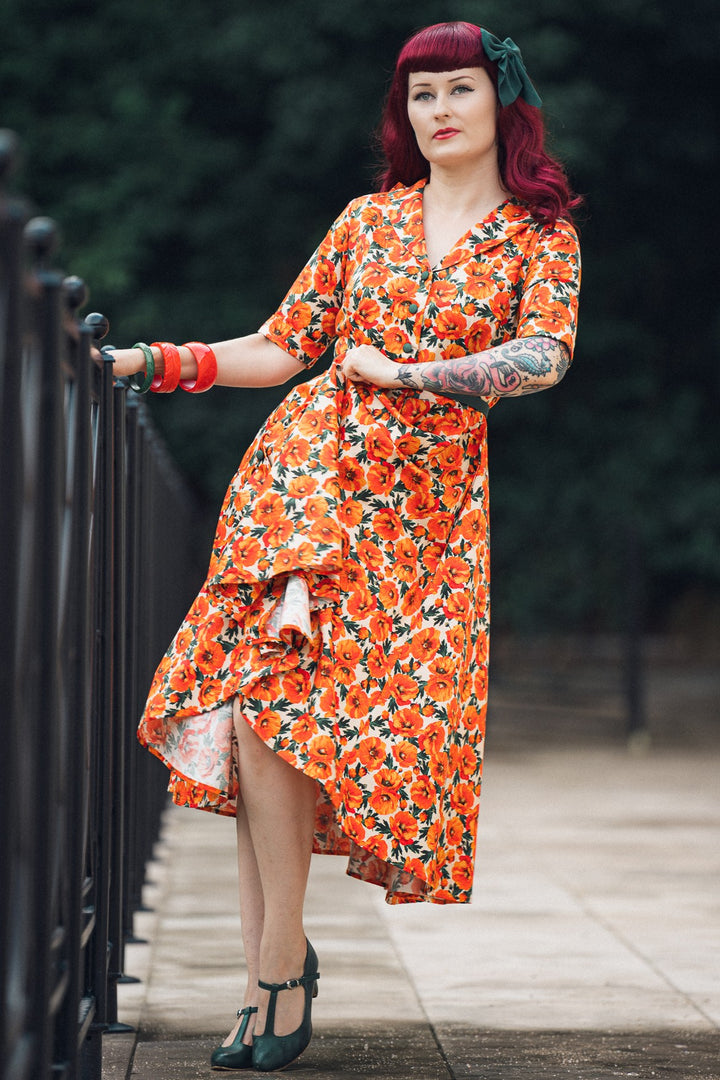 Lady wearing A Mollie Shirt Dress in Orange Poppy Print
