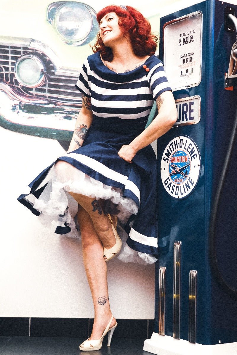 Lady wearing a Darlene Navy White Stripe Dress | Nautical Swing Dress