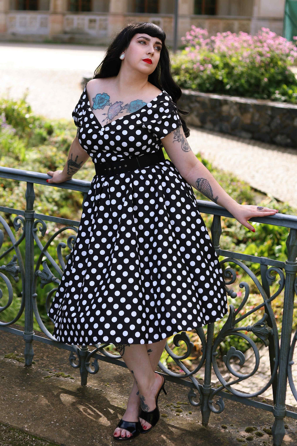 Lady wearing a Lily Black & White Polka Dot Dress | Polka Dot Dress