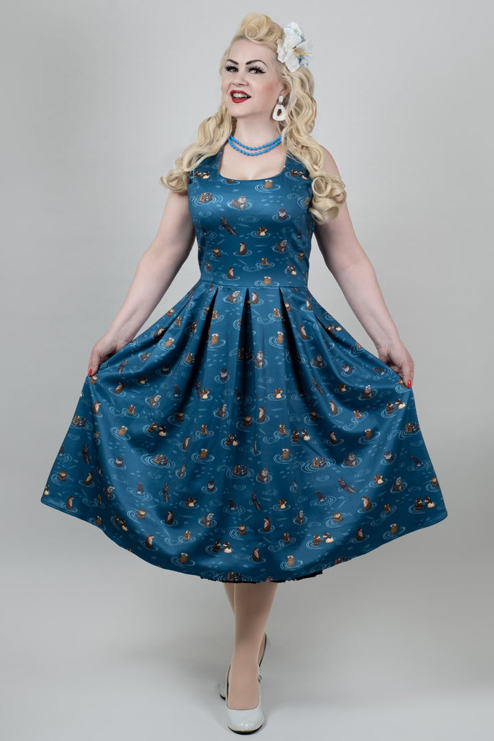 Lady wearing an Amanda Otterly Adorable Swing Dress in Blue