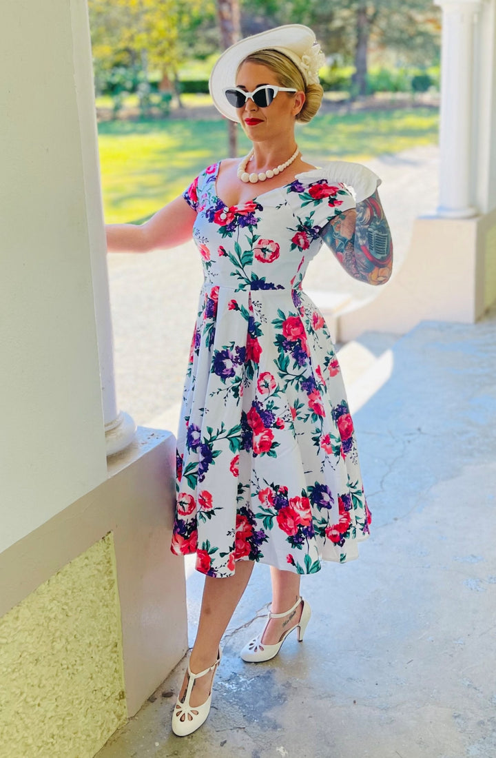Lovely lady wearing a Lily White Floral Off Shoulder Dress