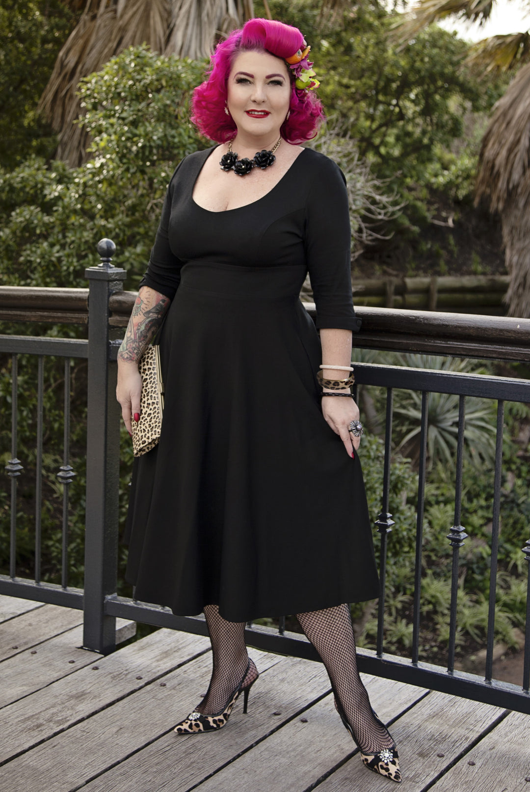 Model in Scarlette Black Long Sleeve Midi Dress