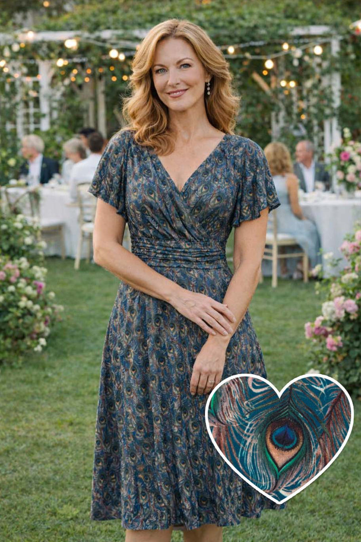 Model in a Donna Peacock Feather Tea Dress