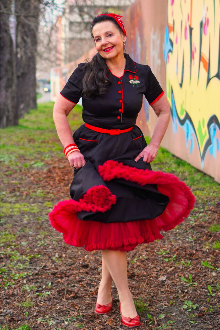 Lady wears a Black Rose Embroidered Rockabilly Shirt Dress