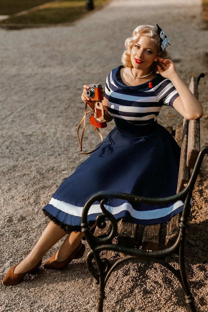 Model wearing a Darlene Navy White Stripe Dress | Nautical Swing Dress