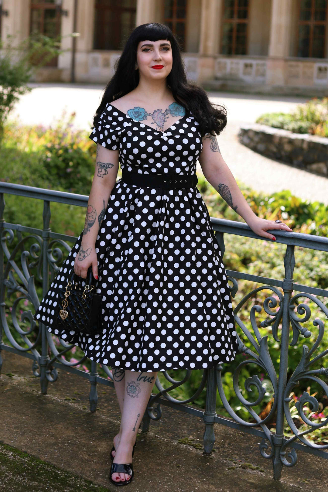 Model wearing a Lily Black & White Polka Dot Dress | Polka Dot Dress