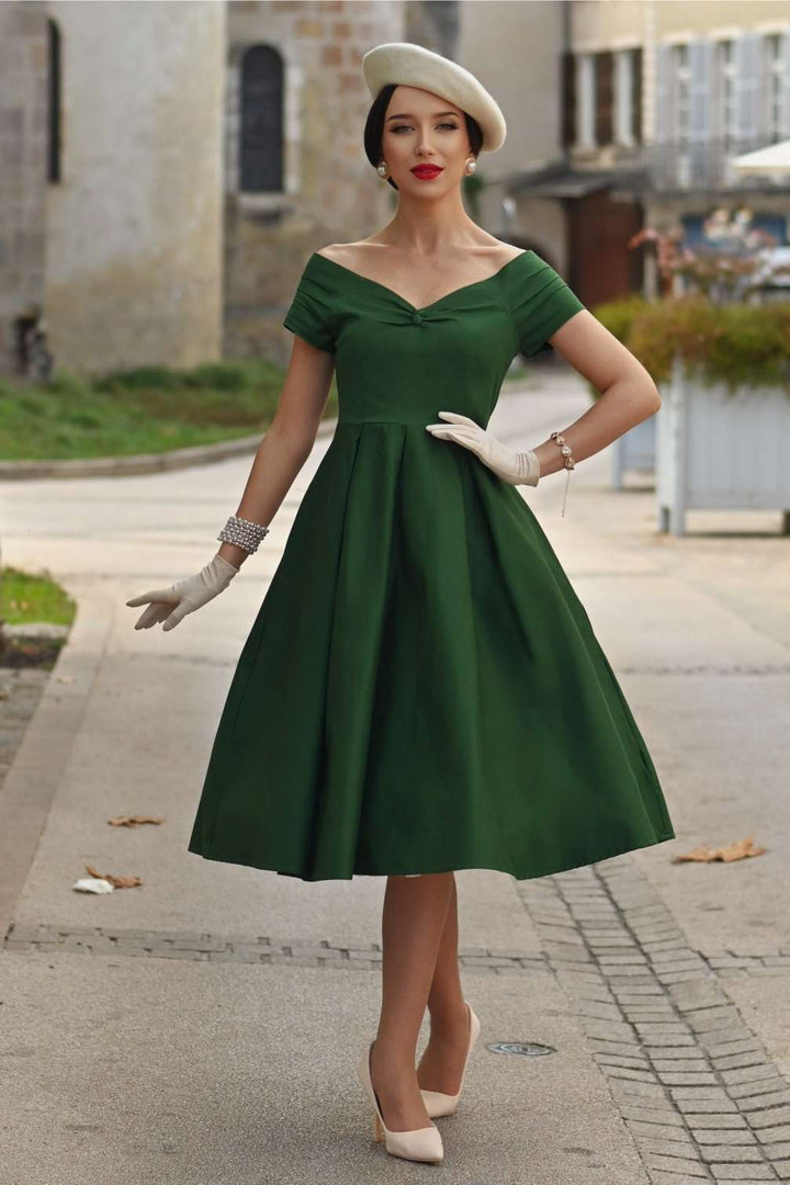 Model wearing a Lily Dark Green Dress | 50s Style Dress