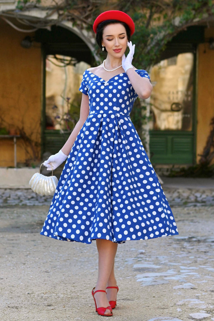 Model wearing a Lily Navy Blue & White Polka Dot Dress | 50s Style Dress