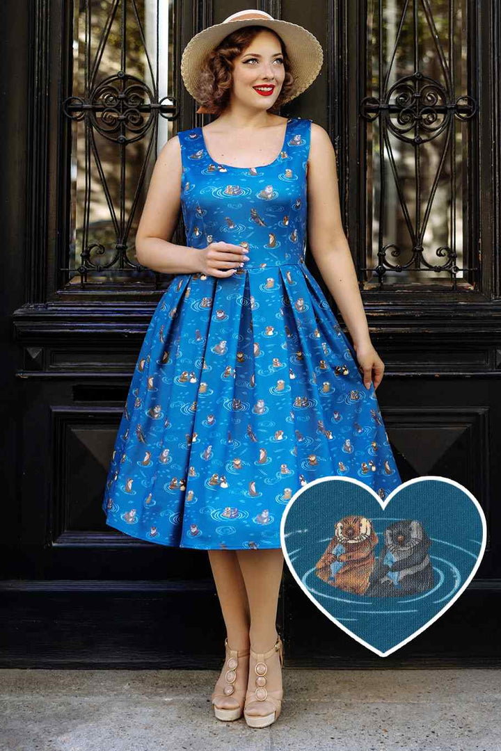Model wearing an Amanda Otterly Adorable Swing Dress in Blue
