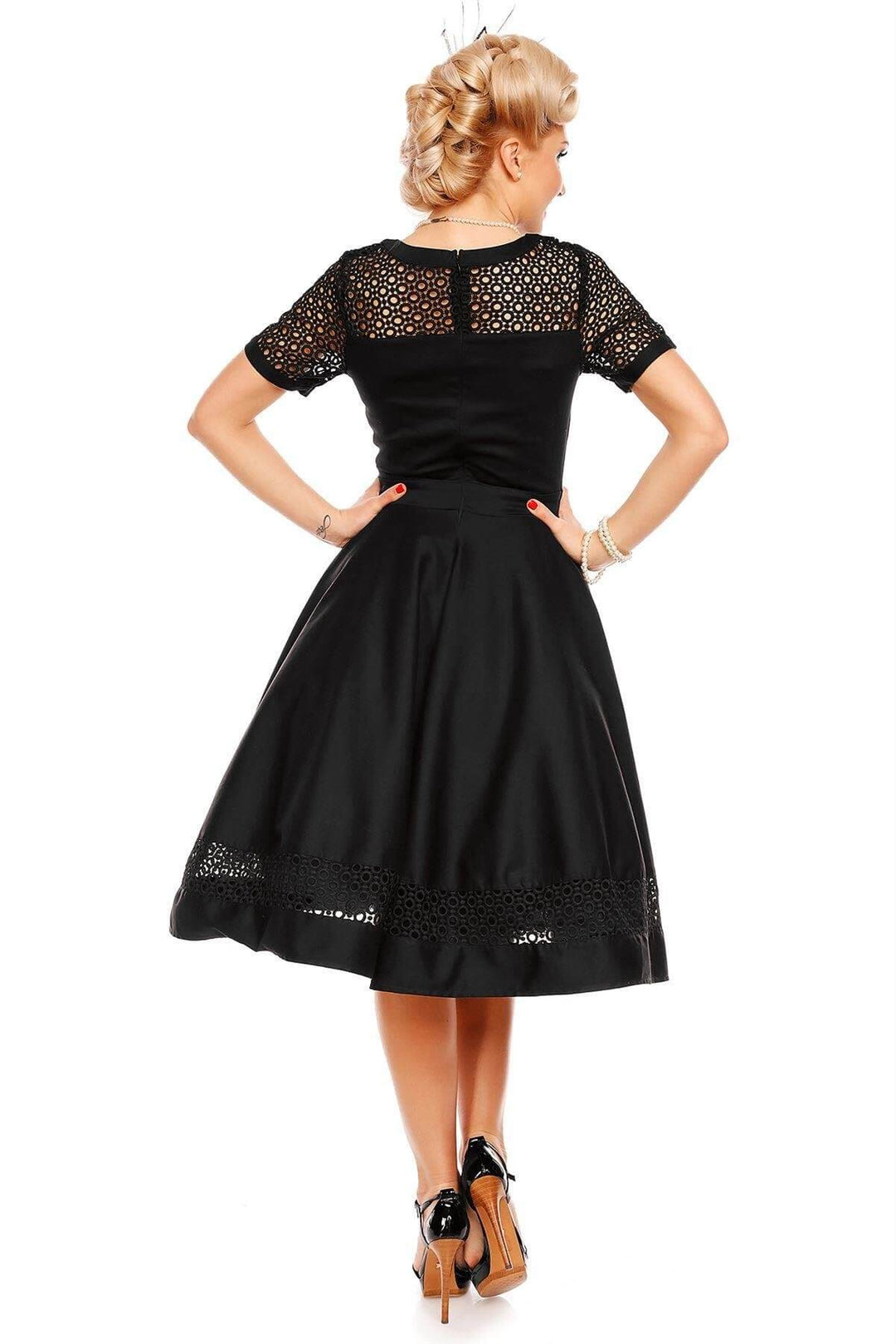 Back view of A model wearing a Tess Crochet Lace Formal Dress In Black