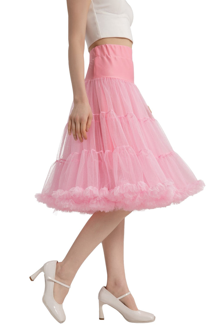 The angle shot of A lady wearing a Hattie Pastel Pink 3-Tier Net Petticoat, 25.5 Inches