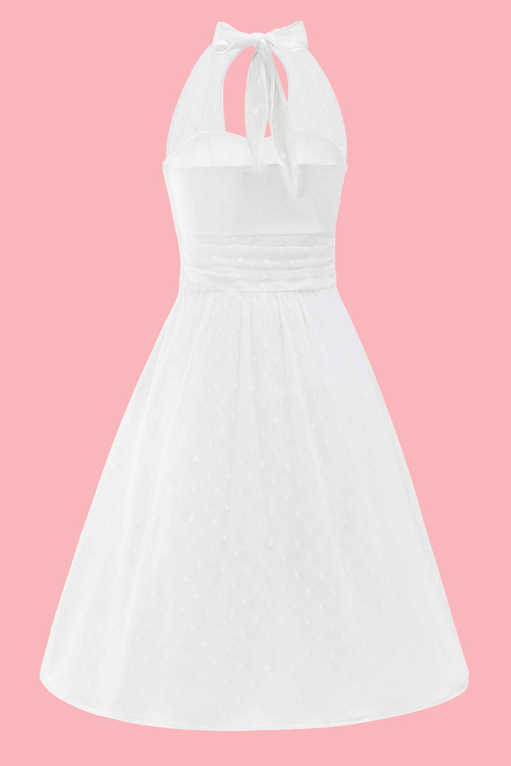 The back of Dorothea White Polka Dot Mesh Halter Midi Dress