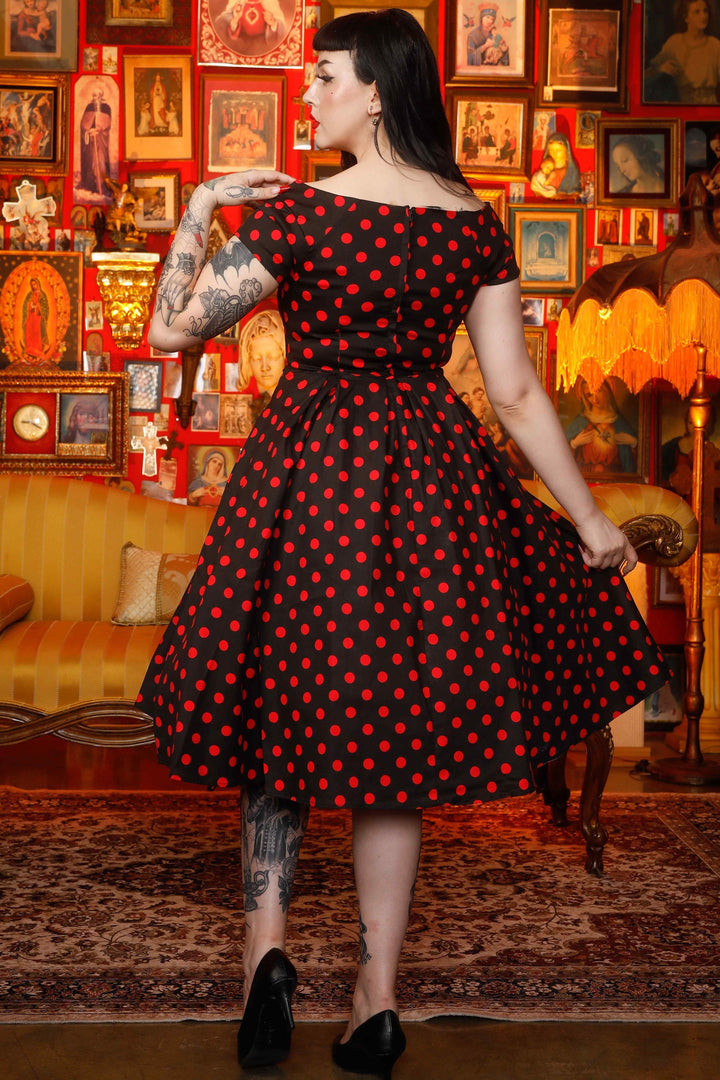 The back of lady wearing a Lily Black & Red Polka Dot Dress | Polka Dot Dress