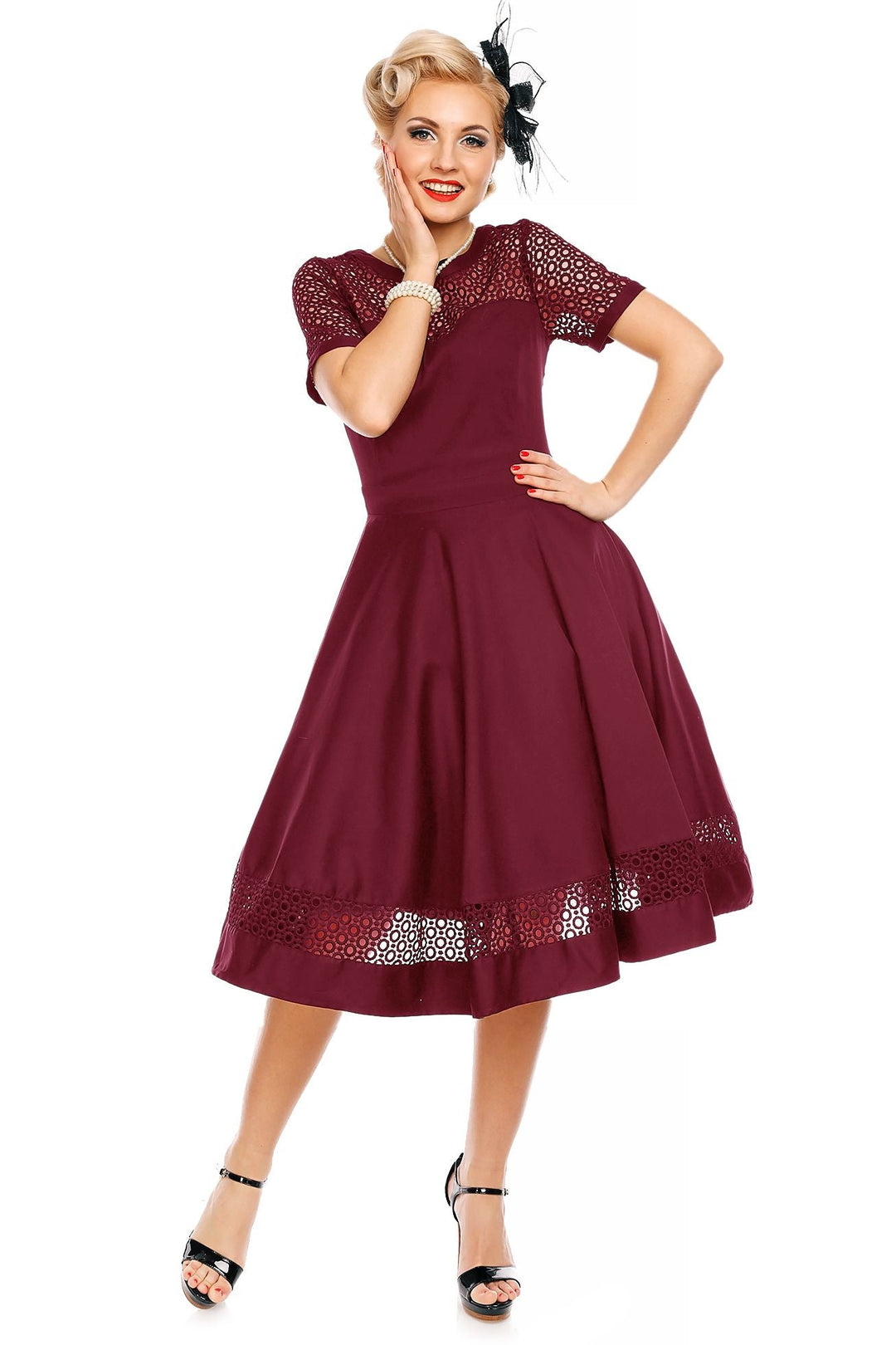 The front of A Model wearing the lovely Tess Crochet Lace Formal Dress