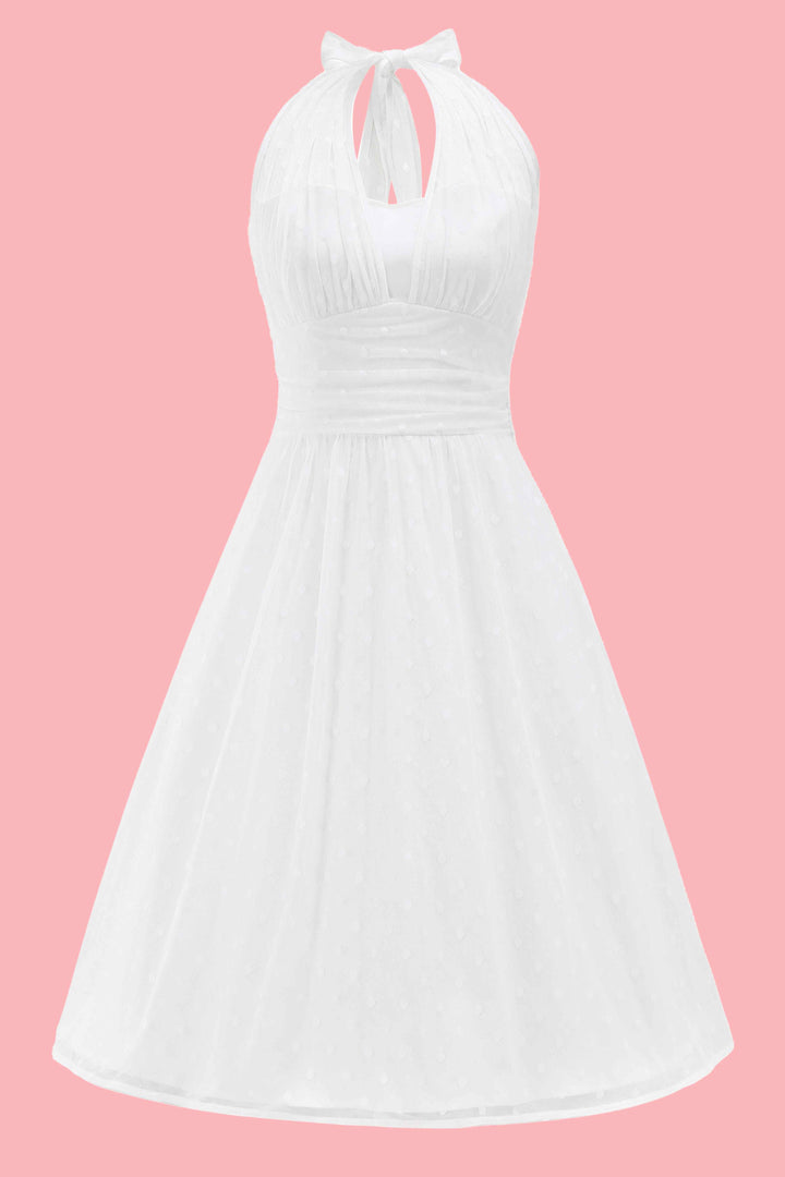 The front view of Dorothea White Polka Dot Mesh Halter Midi Dress