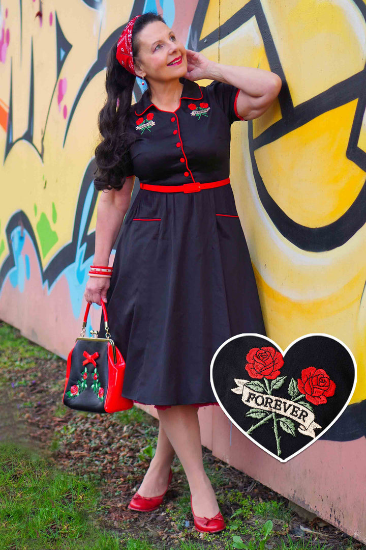 Model wears a Black Rose Embroidered Rockabilly Shirt Dress