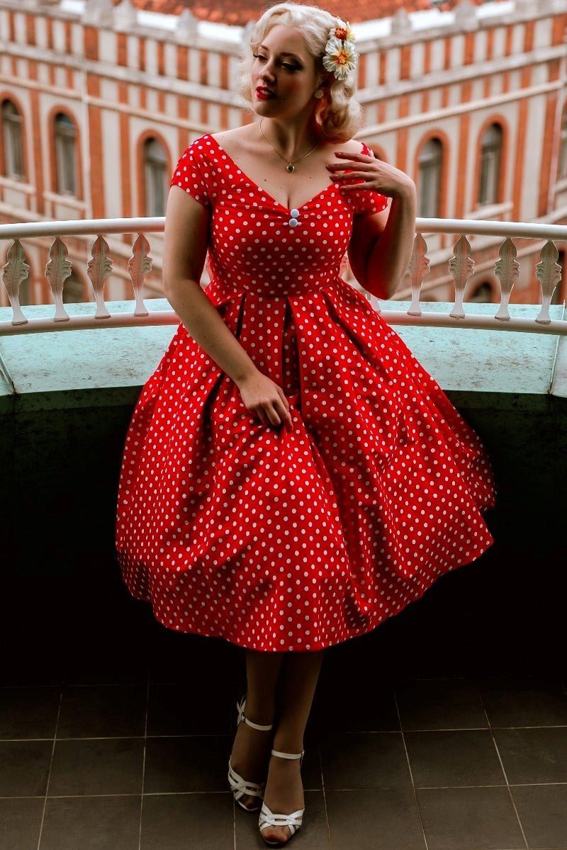 Model wearing a Lily Red Polka Dot Off Shoulder Dress