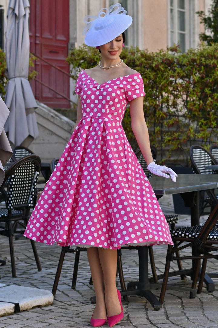 Model wearing a Lily Hot Pink & White Polka Dot Dress | Retro Dress