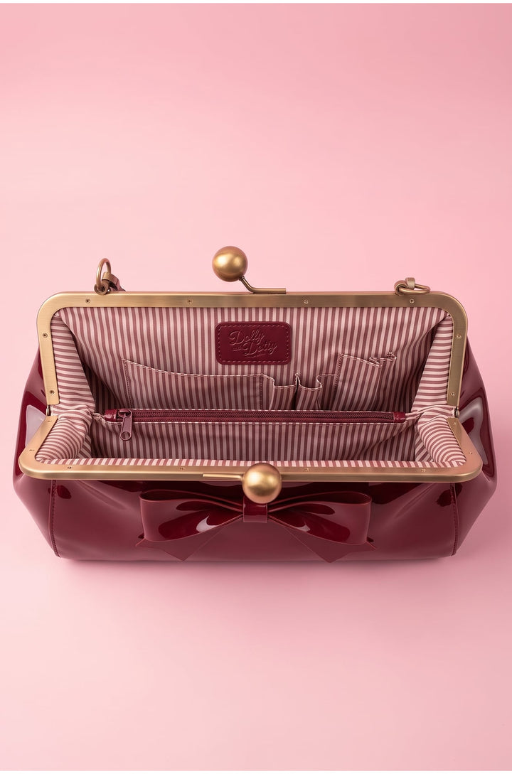 Interior shot of Colette 1950s Kiss-lock Frame Handbag with Bow in Burgundy