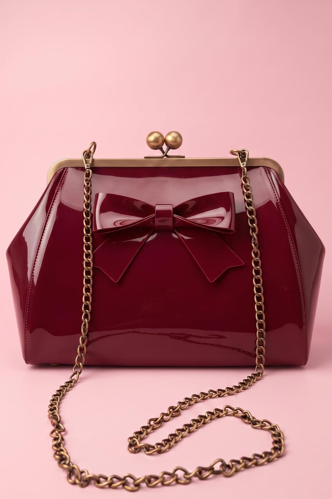 Colette 1950s Kiss-lock Frame Handbag with Bow in Burgundy with chain strap