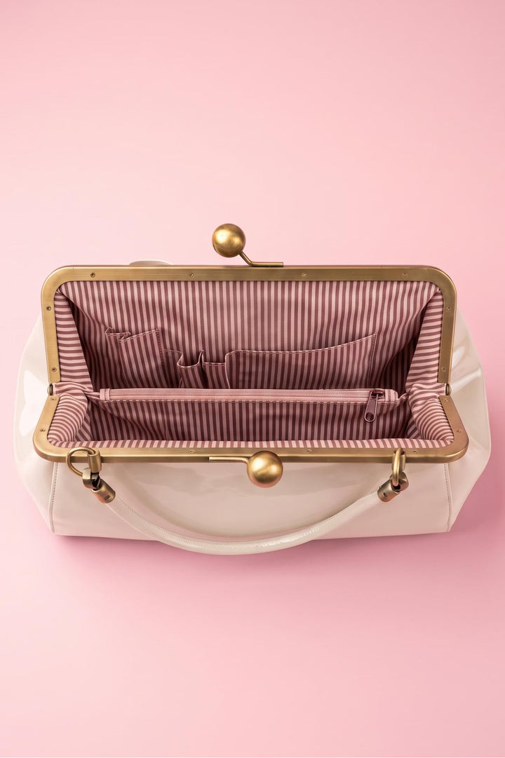 Interior image of Colette 1950s style Kiss-Lock Vintage Ivory Oversized Statement Bow Bag