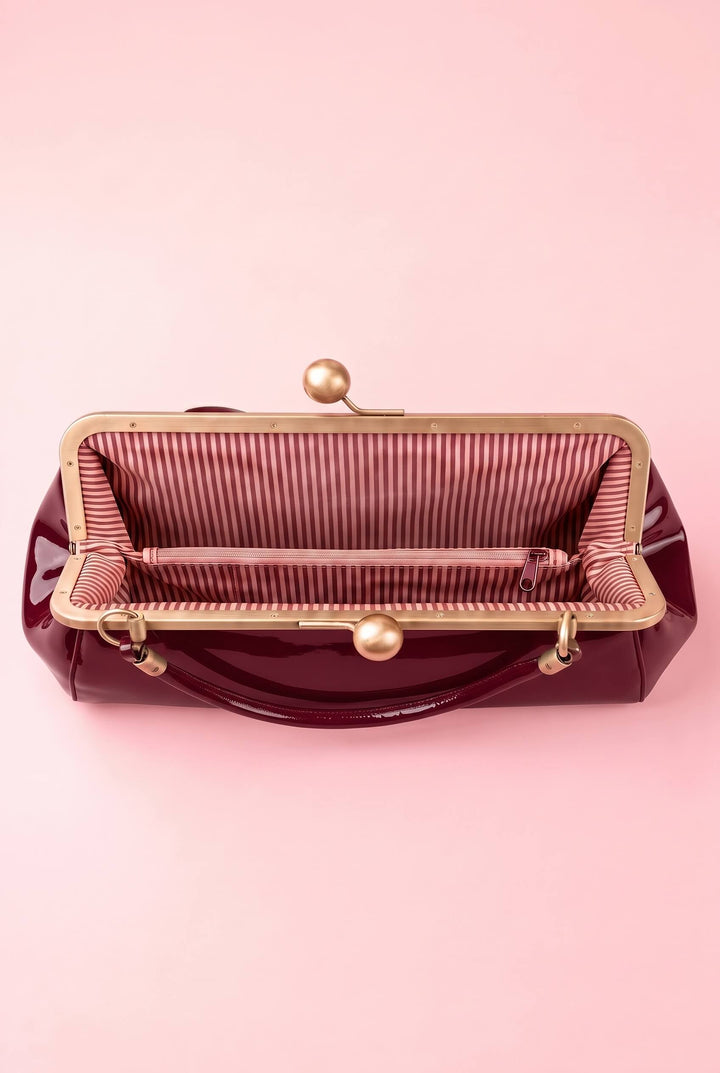 Interior shot of Elise Vintage Compact Kiss-lock Bow Evening Handbag in Burgundy