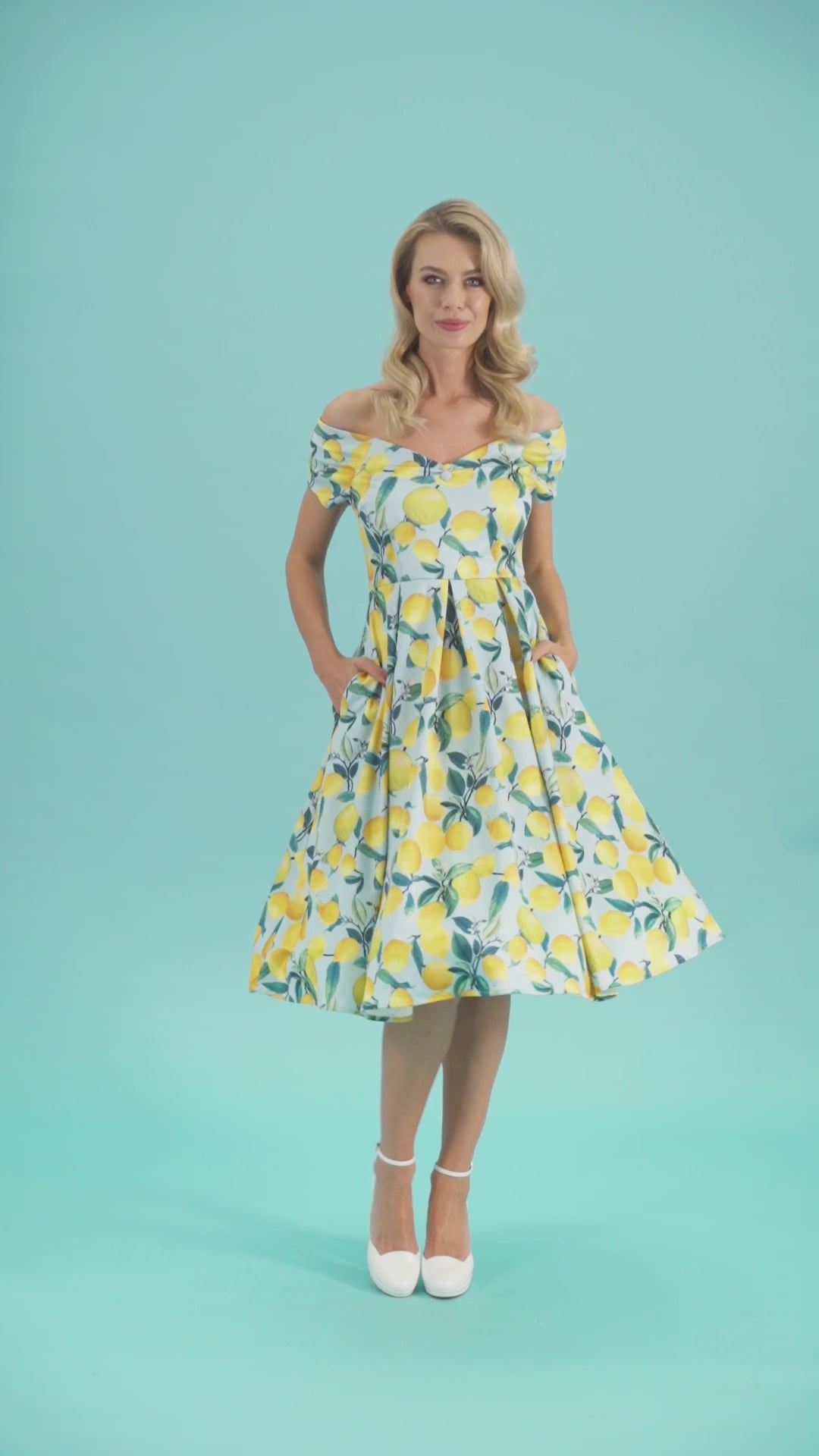 Video of a woman in the Lily Light Blue Lemon Off-Shoulder Summer Midi Dress