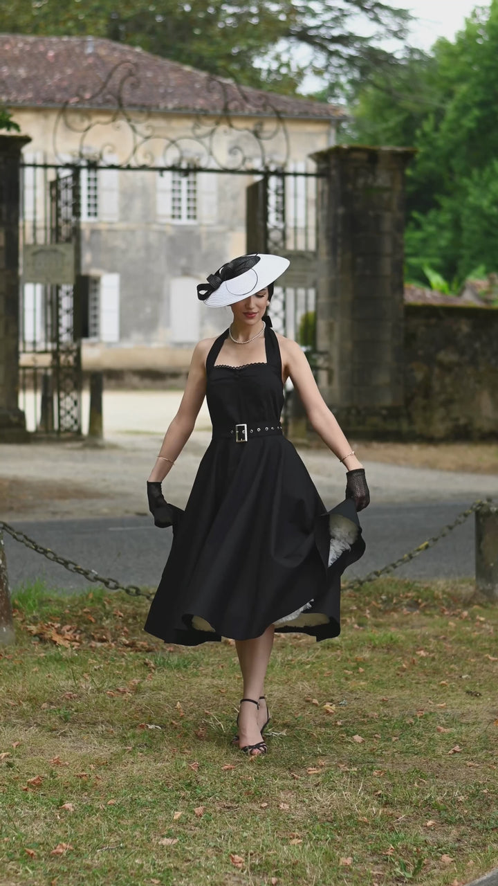 Video of a beautiful lady in Daisy Black Dress | Vintage Halter Dress