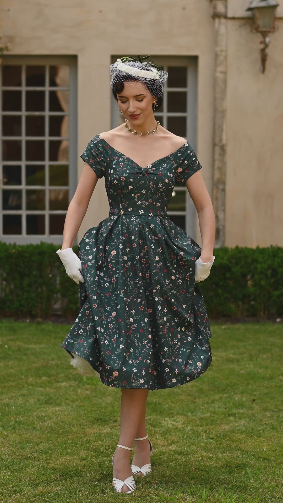 Video of a beautiful lady in our Lily Ditsy Flowers on Emerald Green Dress | Vintage Floral Dress