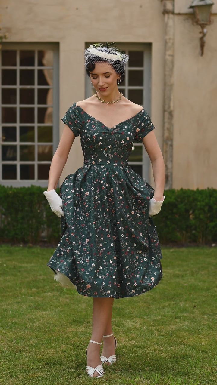 Video of a beautiful lady in our Lily Ditsy Flowers on Emerald Green Dress | Vintage Floral Dress