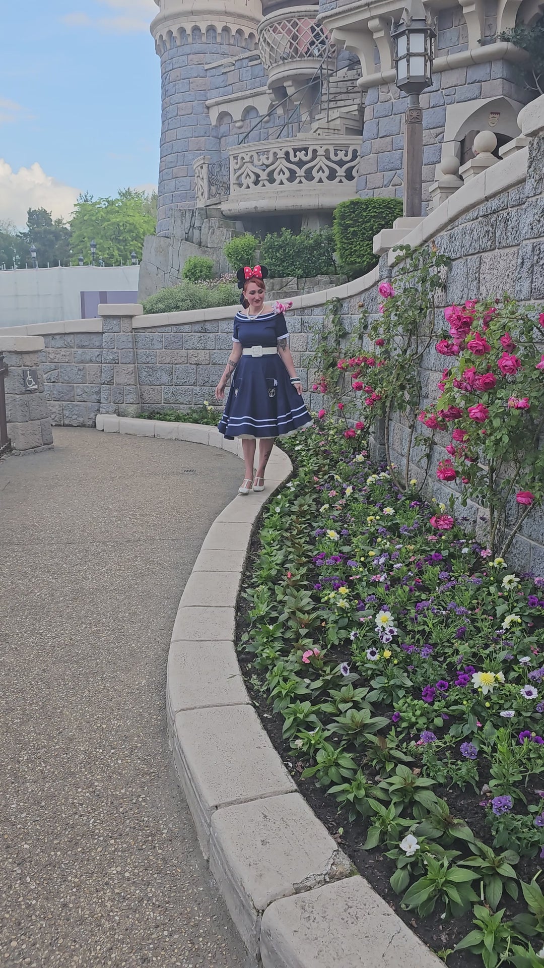 Video a lady wearing a Navy Nautical Anchor Circle Dress